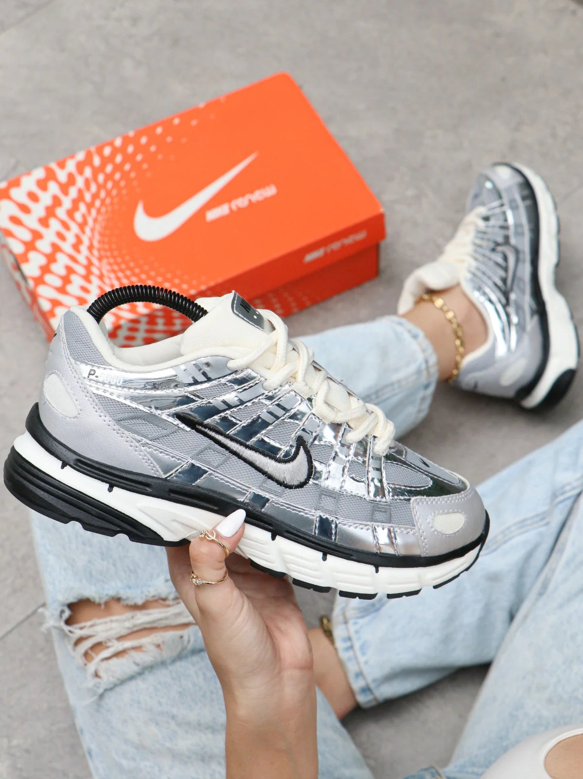 🚀✨ Nike P-6000 "Silver Blast" 👟🔥  El poder del retro con el brillo del futuro.